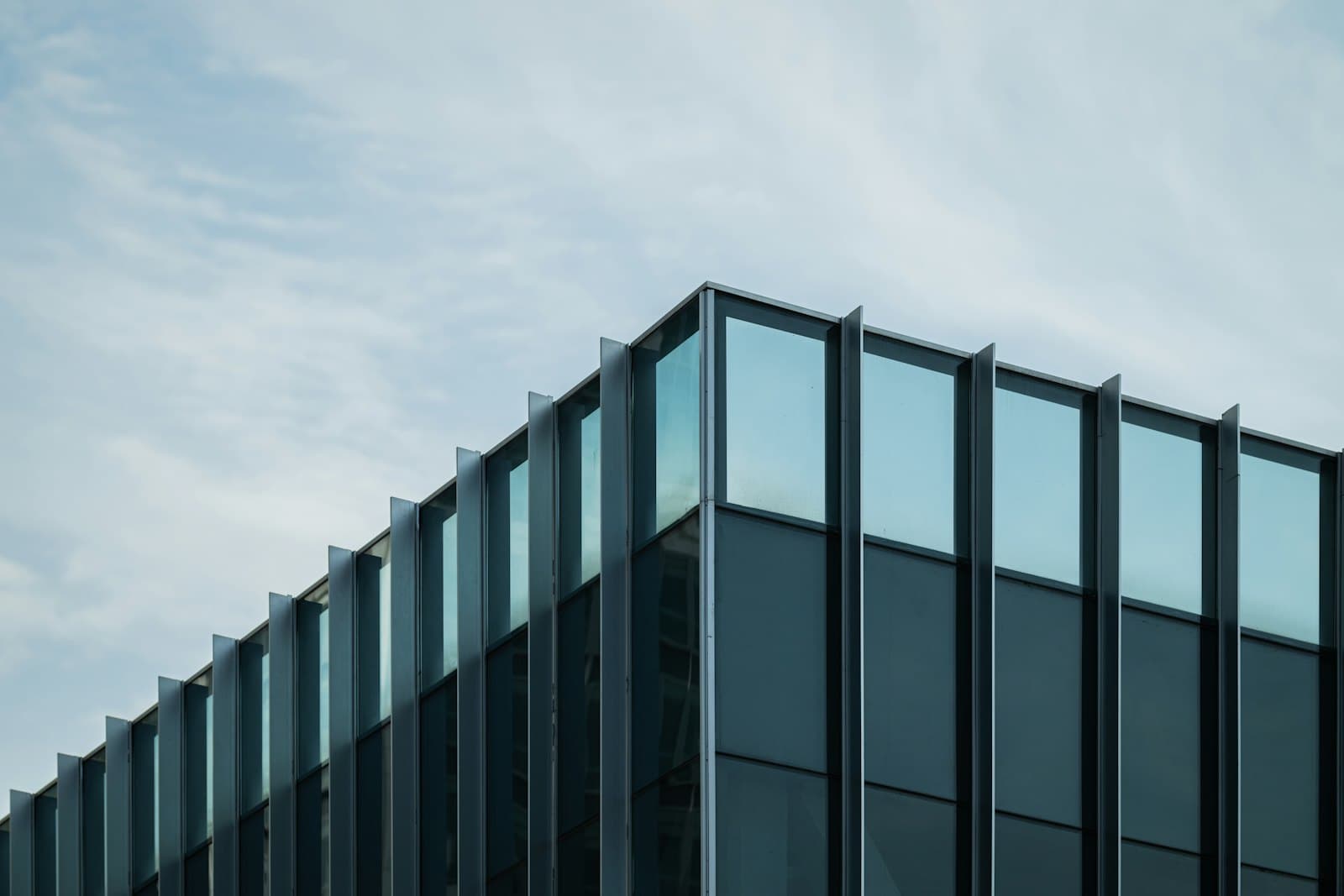 Glazed office building facade against the sky