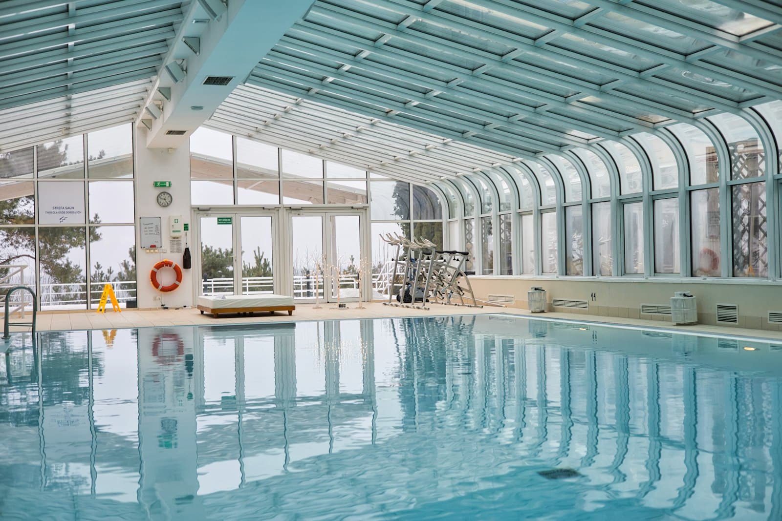 Indoor pool under a glazed enclosure