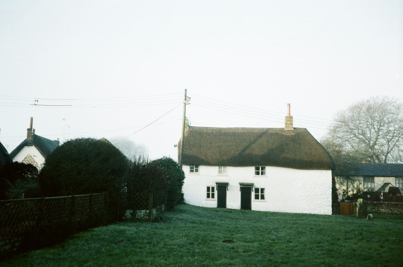 White thatched cottage on a frosty morning