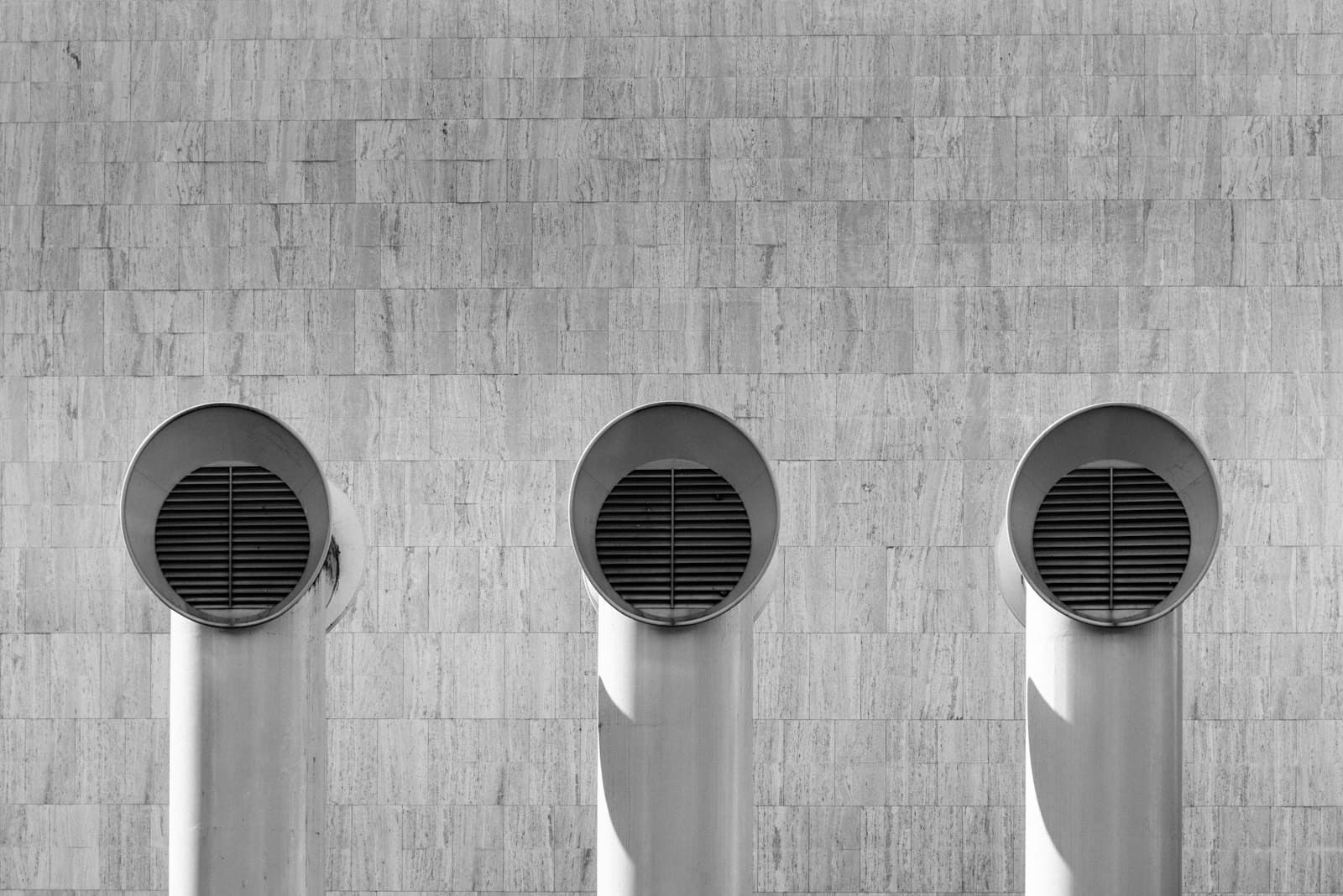 Round ventilation outlets on a wall